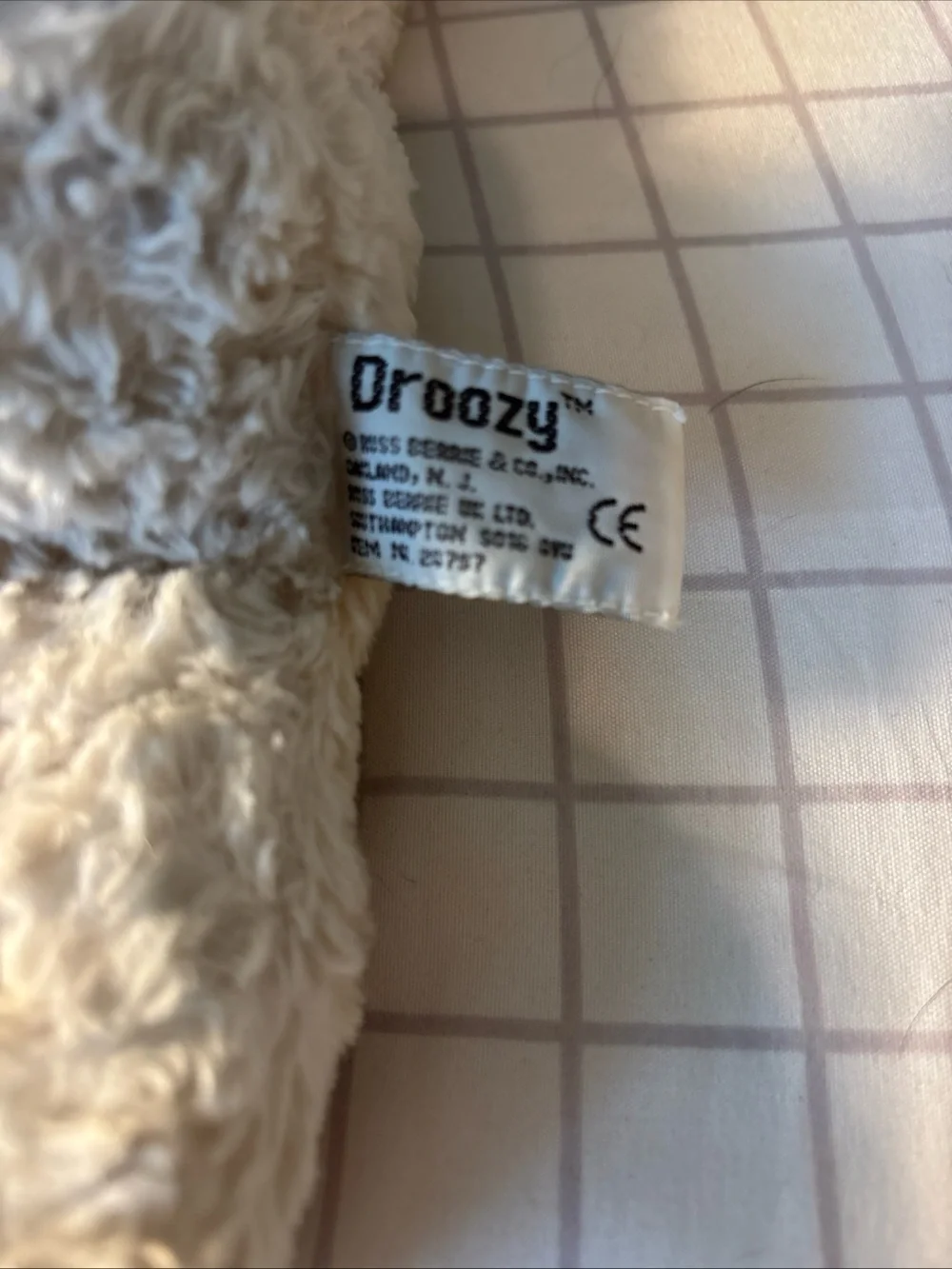 Russ Berrie Brown, White and Black Plush Dog Toy dogs name is droozy